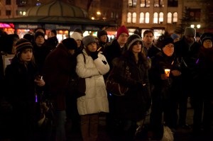 People gather for a candlelight vigil for the victims of the 2011 Tucson, Arizona, shooting that killed six people and left Congresswoman Gabrielle Giffords critically injured. The shooting prompted some lawmakers to call for a re-examination of the country's gun laws.