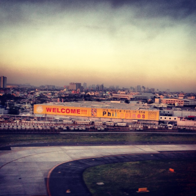 A sign greets planes landing at the airport in Manila. 