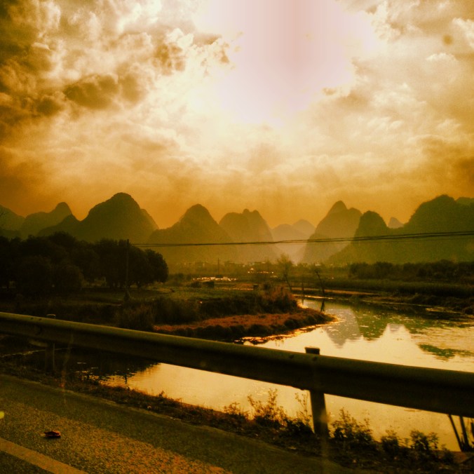In a cab, somewhere between Guilin and Yangshuo.